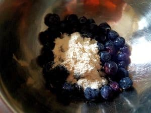 Sprinkle Some Flour Mix On Blueberries