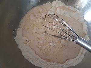 3. Pour wet-mix into flour-mix.