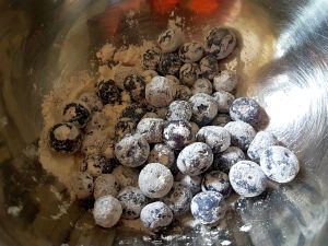 Toss Blueberries And Flour To Coat Well