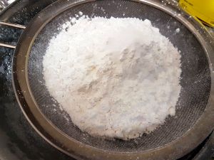 In A Sieve Add Flour And Cornstarch