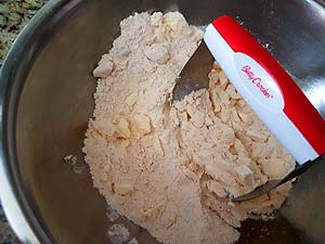 9) Use pastry blender to cut in butter.