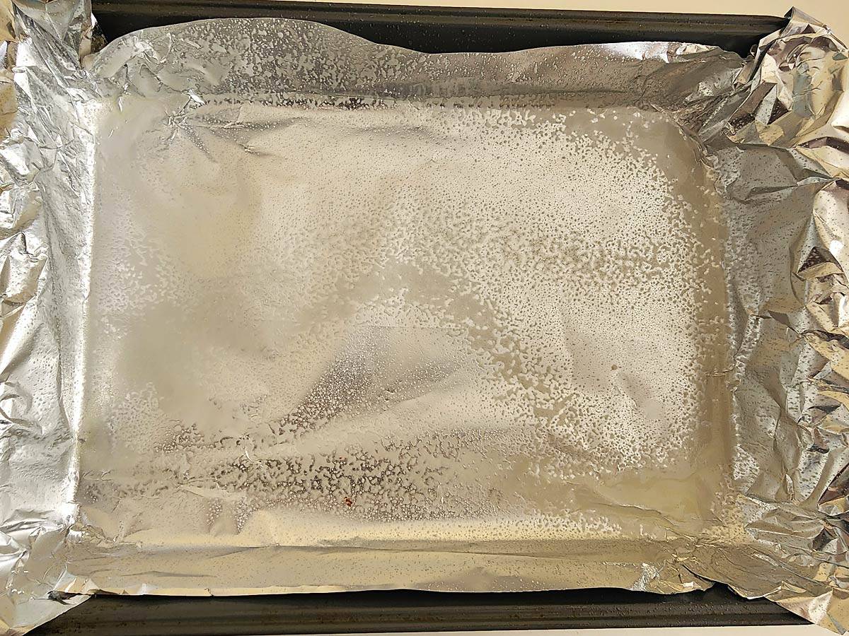 Line a pan with aluminum foil