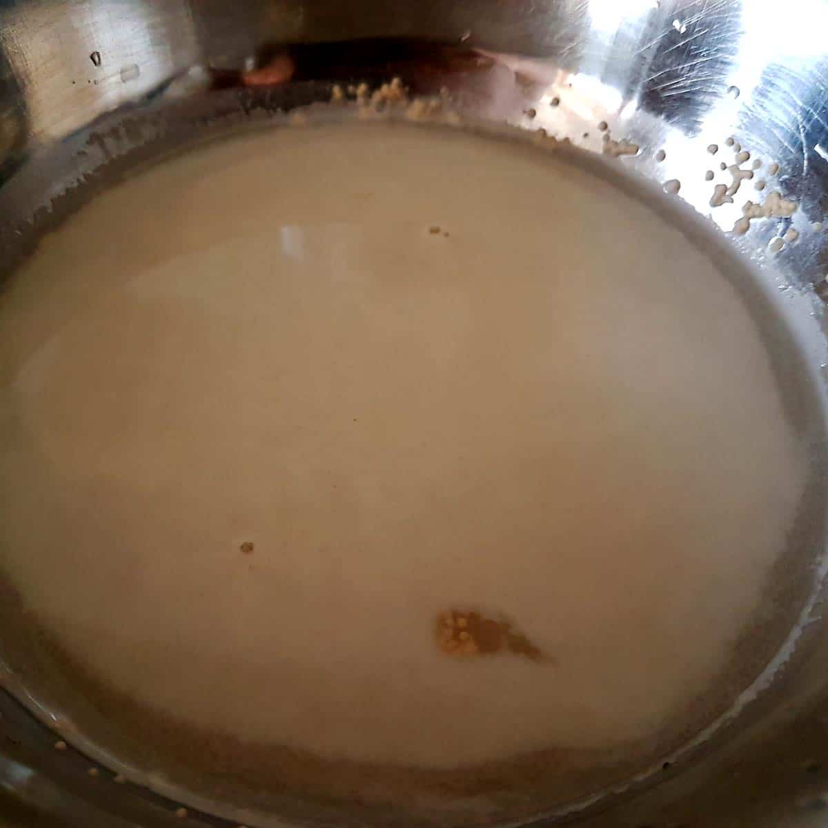 Mix warm water with yeast