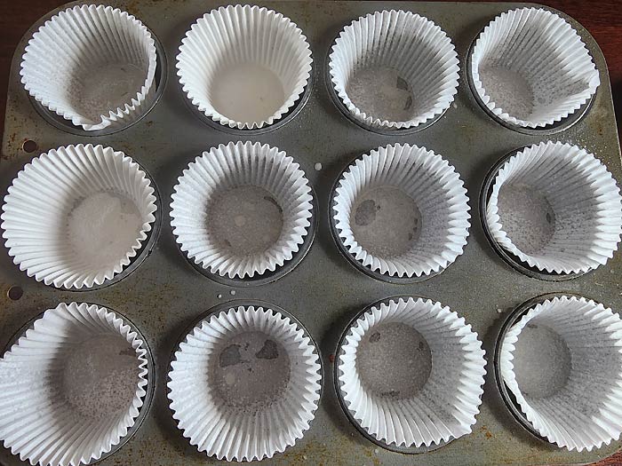 Line Muffin Tins With Paper Liners And Spray Oil