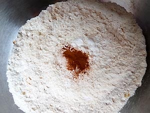 Add cinnamon and baking powder to the dry mix.