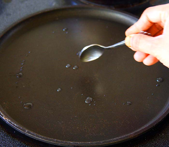 Heat a griddle at medium-high. Once the pan is hot add the butter or oil.