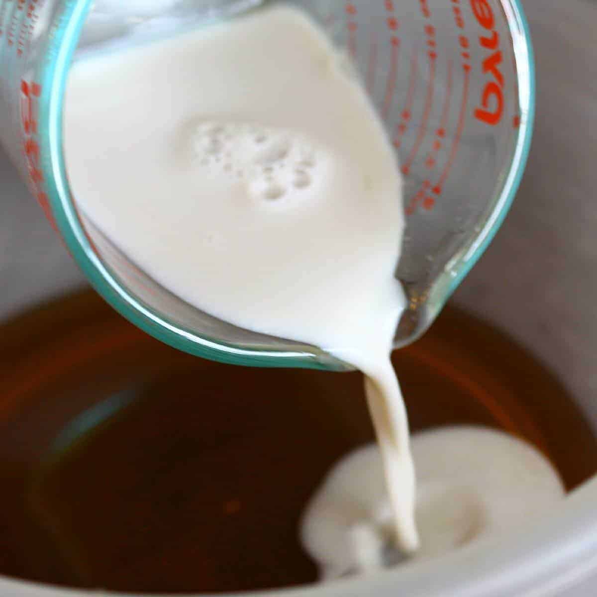 Mix almond milk and maple syrup