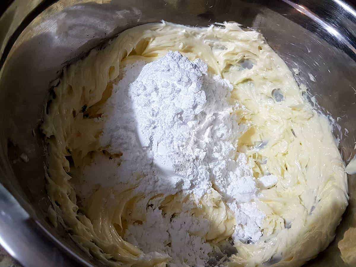 Add the sifted icing sugar to butter