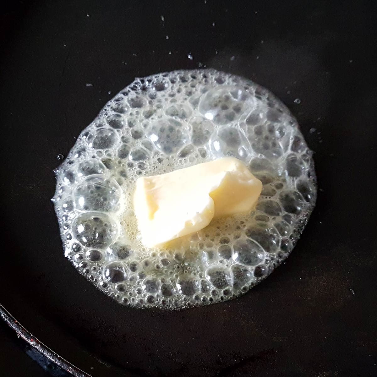 Melt butter on the griddle