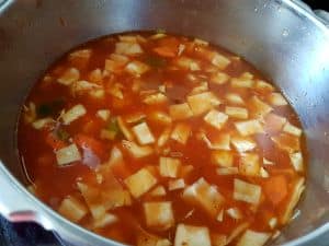 Add Broth and cook for 15 Mins. Stir In spinach If using.