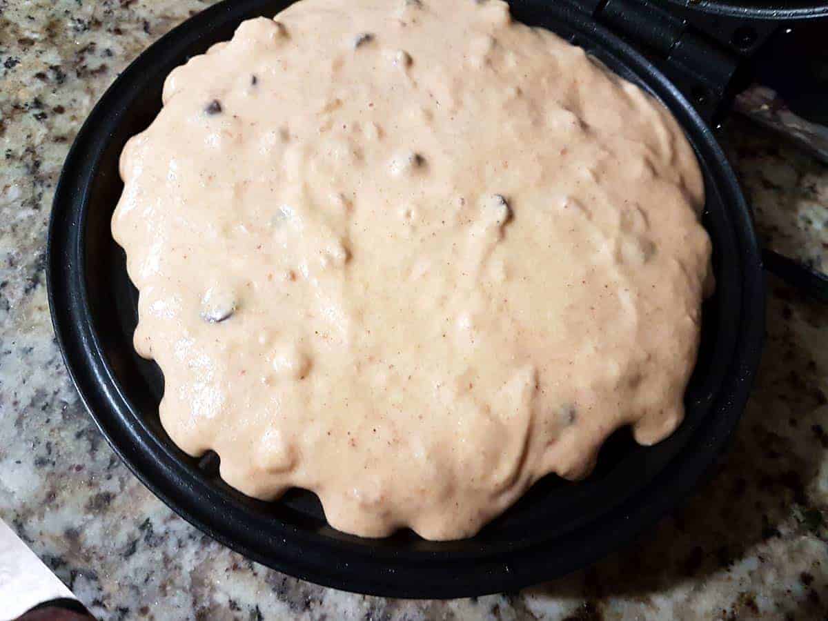 Pour about a third of a cup of batter