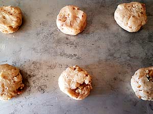 Drop dough and flatten it lightly.