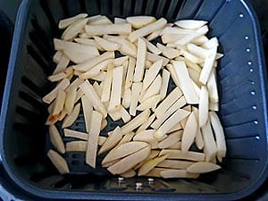 Arrange Oiled Potaotes In Air Fryer Basket