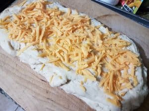 Roll Dough Into Rectangle Sprinkle Cheese