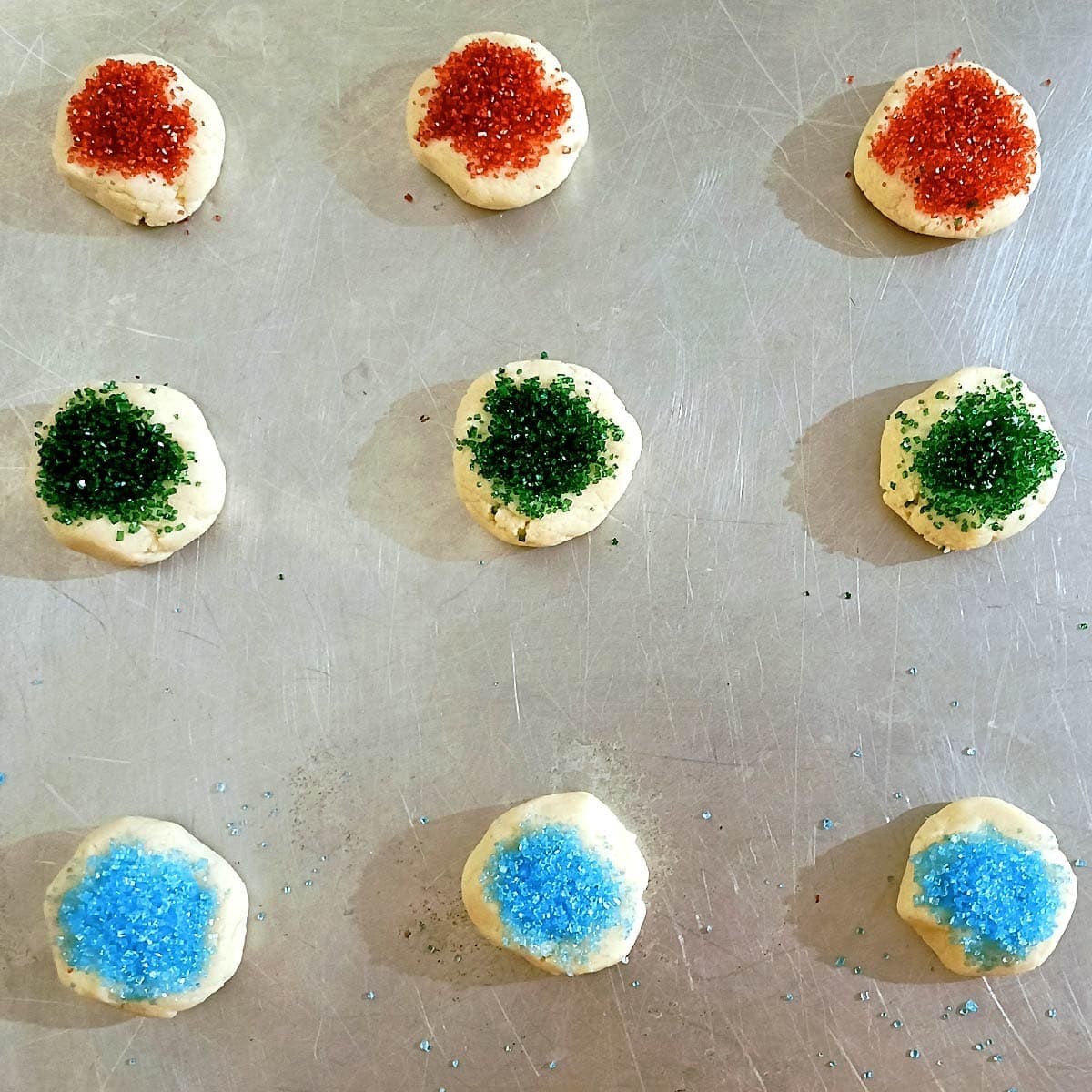 Scoop out a tablespoon of cookie dough into baking pan