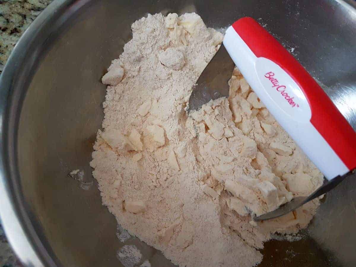 Use pastry blender to cut in butter