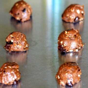 chocolate chip cookies dough on baking sheet