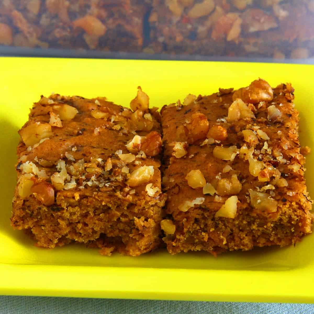 vegan banana bars topped with walnuts