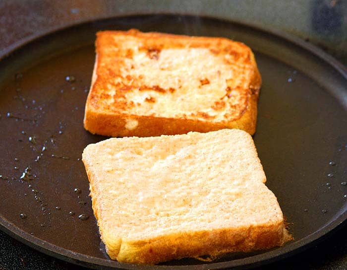 Flip the toast once it becomes golden brown.